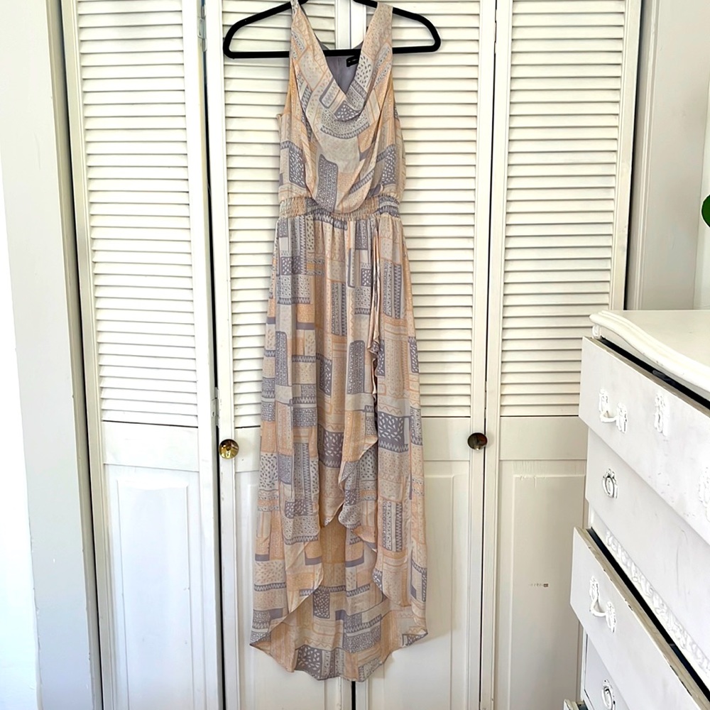 The Addison Story dress. Subtle high / low hem and flattering cowl neck cut.